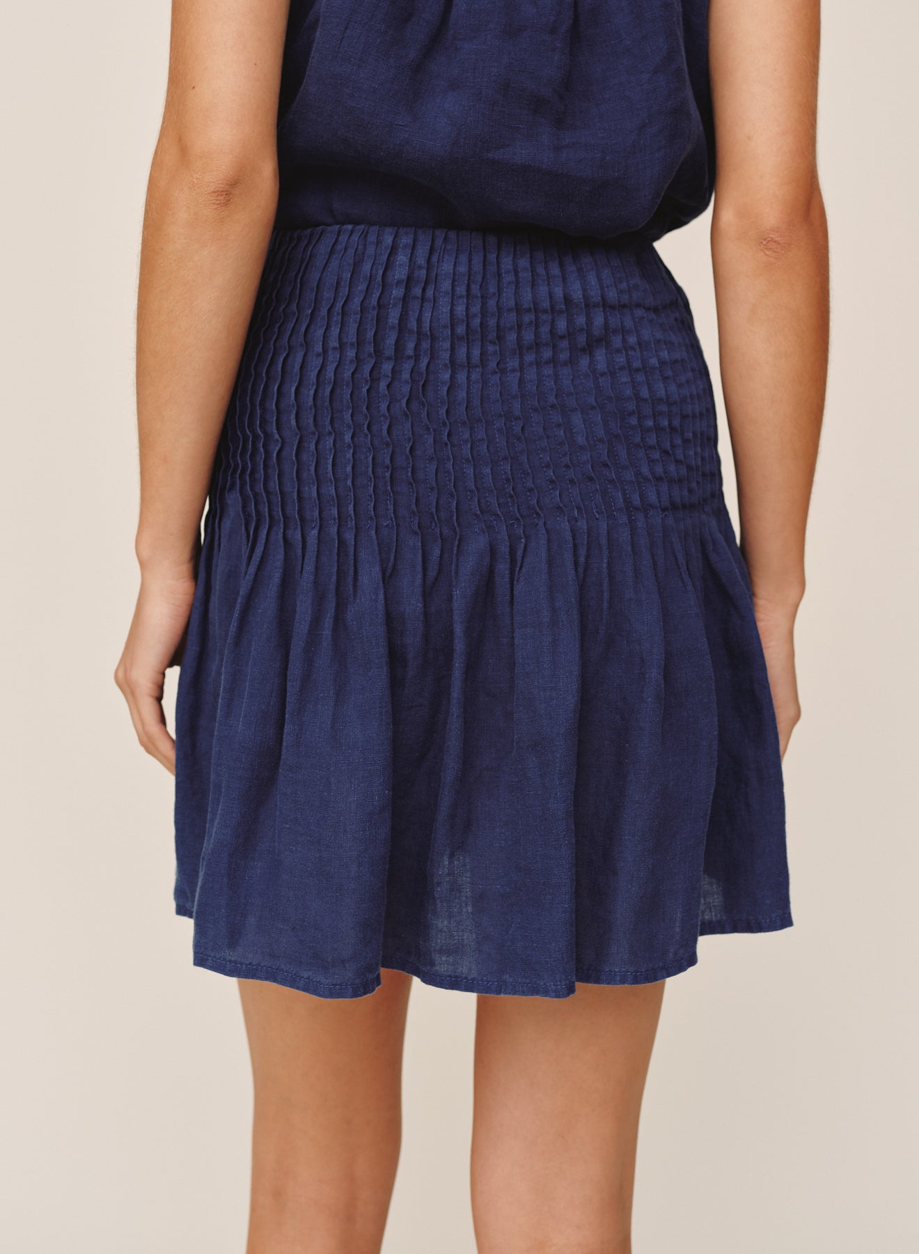 B3092-331-302 - PINTUCK MINI SKIRT